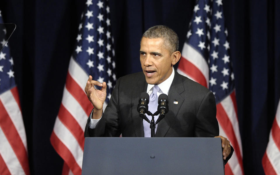 President Barack Obama speaks at the Democratic National Committee Winter Meeting in Washington, Friday, Feb. 28, 2014. (AP Photo/Susan Walsh)