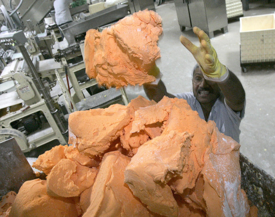 Dough for orange Sweethearts at a&nbsp;Necco factory in Revere, Massachusetts. (Photo: Mark Wilson/Boston Globe via Getty Images)