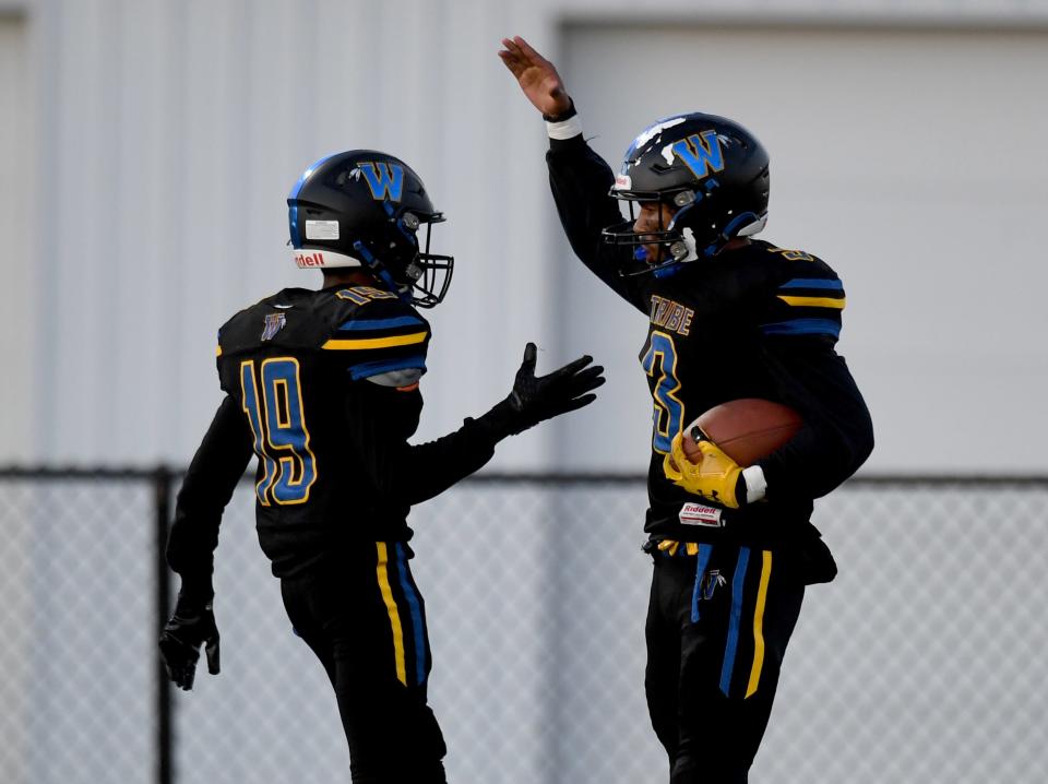 Wi-Hi's Darius Foreman (3) celebrates his touchdown against Queen Anne's with Isaac Franklin (19) Thursday, Oct. 20, 2022, at Wicomico County Stadium in Salisbury, Maryland.