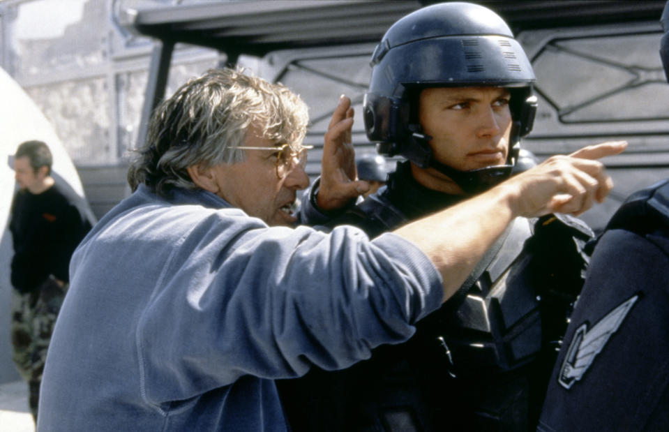American actor Casper Van Dien with Dutch director Paul Verhoeven on the set of his movie Starship Troopers, based on the book by Robert A. Heinlein. (Photo by TriStar Pictures/Sunset Boulevard/Corbis via Getty Images)