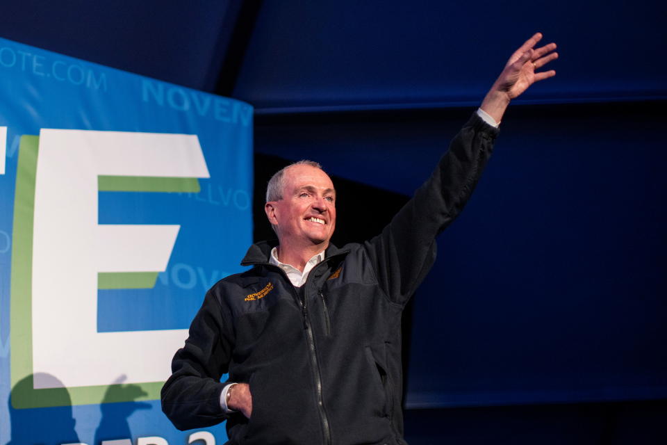 New Jersey Gov. Phil Murphy waves at a campaign event in New Brunswick.