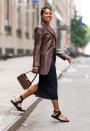 <p>Gabrielle Union pairs a stylish leather Sportmax jacket with a black skirt as she heads out in N.Y.C. on July 25.</p>