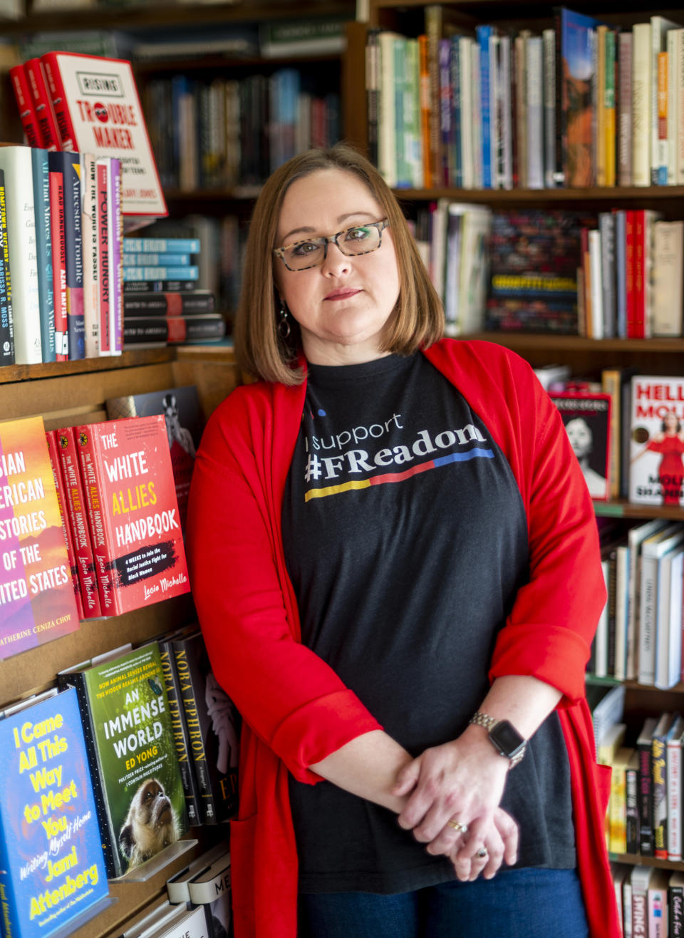 Amanda Jones poses at Cavalier House Books in Denham Springs, La., on Aug. 12, 2022. (Emily Kask for NBC News)