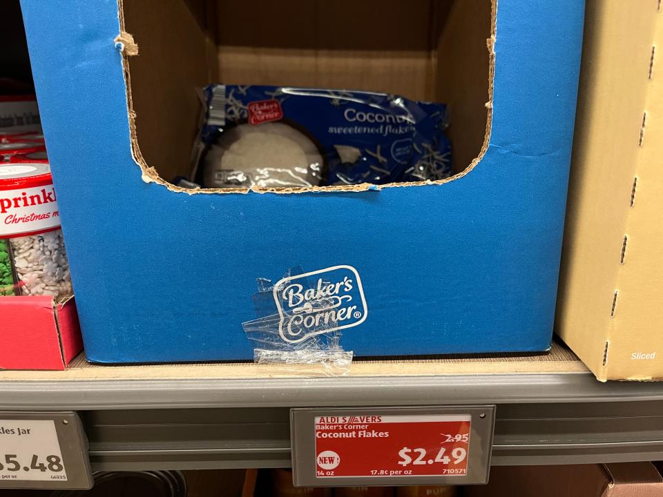 bags of coconut flakes on the shelves at aldi