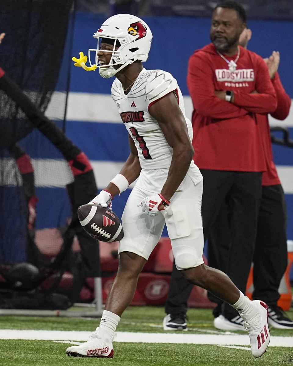 Louisville wide receiver Jamari Thrash celebrates after a catch during the first half of an NCAA college football game against Indiana, Saturday, Sept. 16, 2023, in Indianapolis. (AP Photo/Darron Cummings)