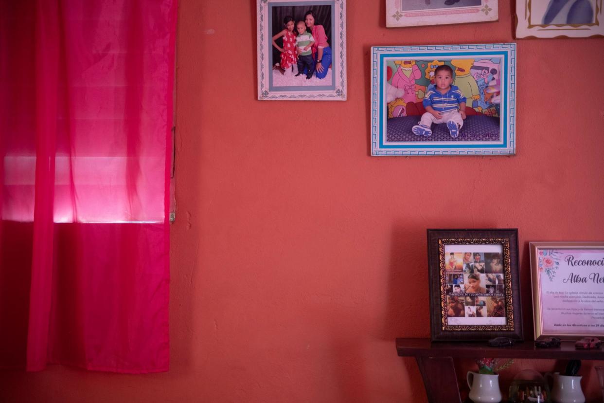 <span>A framed collage of photos of Rossa Nelly, who died after getting a backstreet abortion, at her mother’s home in Santo Domingo, Dominican Republic.</span><span>Photograph: Tatiana Fernandez/The Guardian</span>