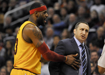 LeBron James pushed Cavs coach David Blatt out of the way to keep him from getting a technical. (USA Today)