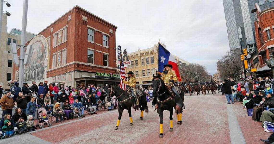 The 2016 Stock Show parade passes the Jett Building in Sundance Square plaza.