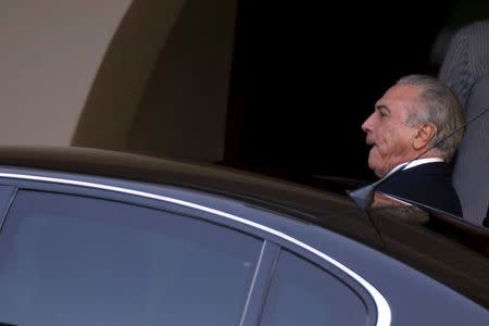 Brazil's Vice President Michel Temer leaves the house of senator Renan Calheiros after a meeting with senators of the Brazilian Democratic Movement Party (PMDB) in Brasilia, Brazil March 28, 2016. REUTERS/Adriano Machado