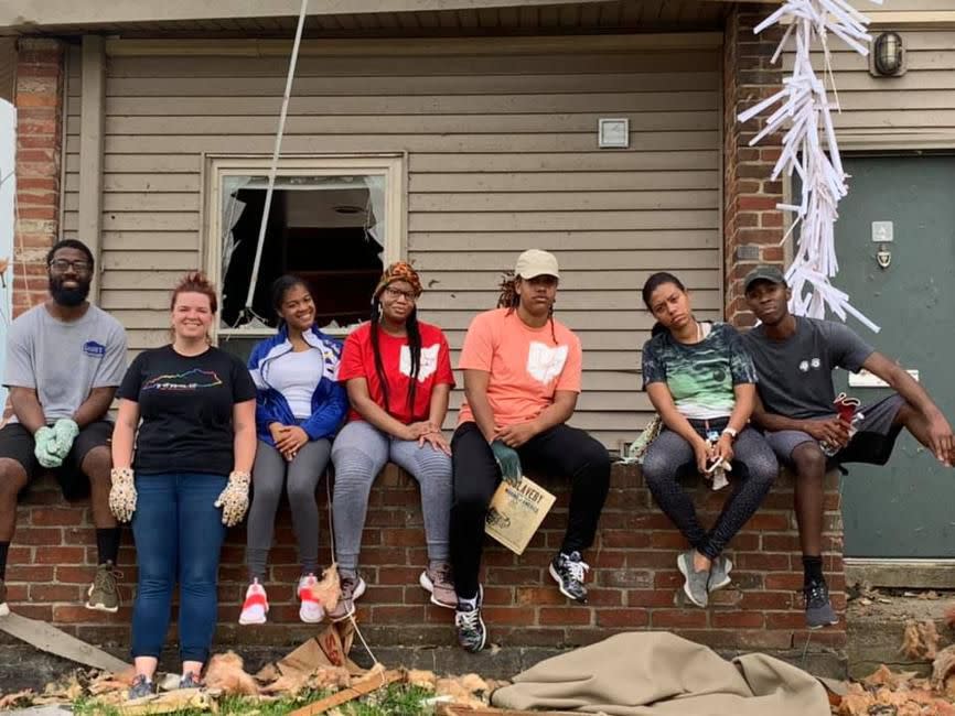 Daj za Demmings (pink shirt) is the president of Dayton Young Black Professionals.