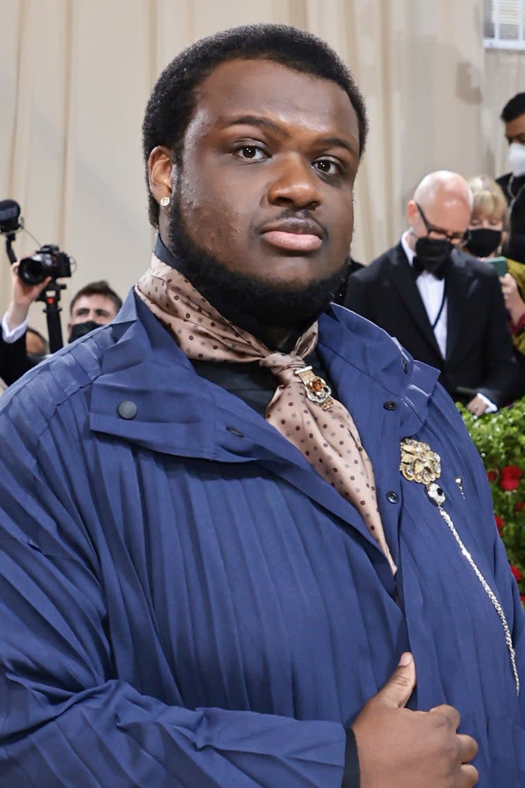 Jaquel in oversized blue coat and black trousers at the Met Gala