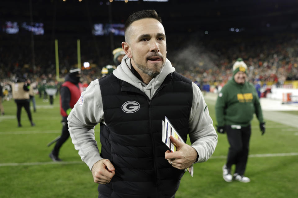 Green Bay Packers head coach Matt LaFleur runs off the field after an NFL football game against the Kansas City Chiefs, Sunday, Dec. 3, 2023 in Green Bay, Wis. (AP Photo/Matt Ludtke)