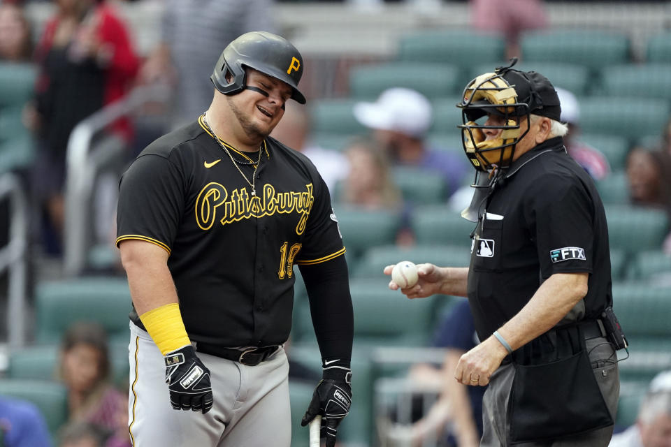 Pittsburgh Pirates' Daniel Vogelbach reacts after a called third strike by home plate umpire Larry Vanover during the first inning of the team's baseball game against the Atlanta Braves on Friday, June 10, 2022, in Atlanta. (AP Photo/John Bazemore)
