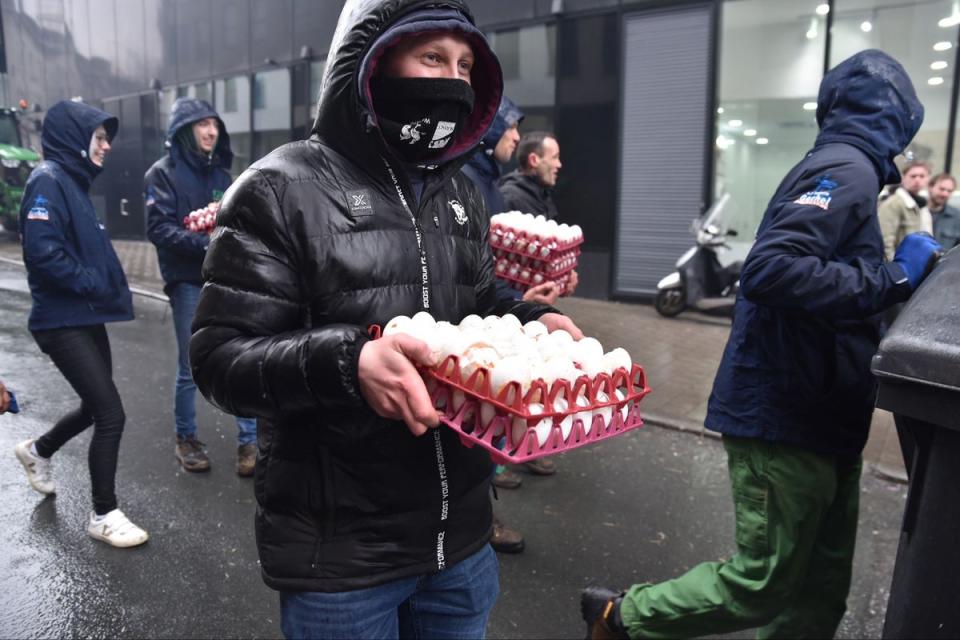 Protesters were seen carrying trays of eggs at Monday’s protest (AP)