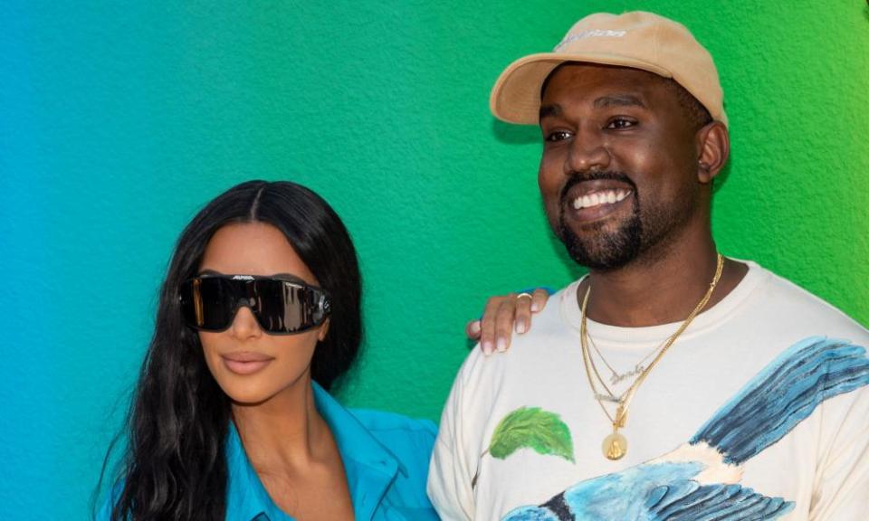 Kim Kardashian West and Kanye West at the spring/summer Louis Vuitton show at Paris men’s fashion week, 21 June.