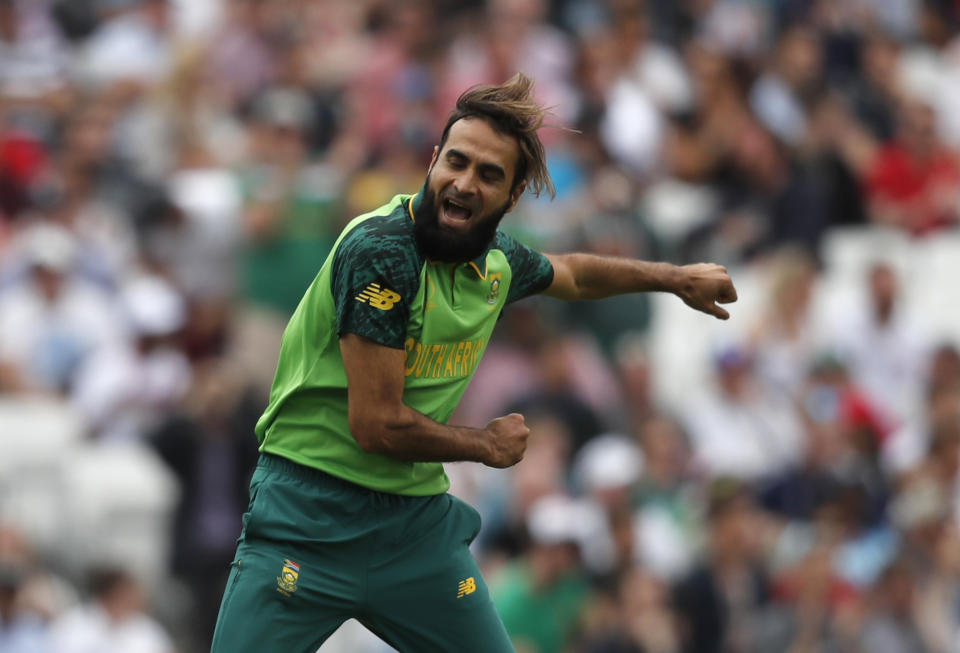 South Africa's Imran Tahir celebrates after taking the wicket of England's captain Eoin Morgan caught by South Africa's Aiden Markram during their Cricket World Cup match at the Oval in London, Thursday, May 30, 2019. (AP Photo/Frank Augstein)