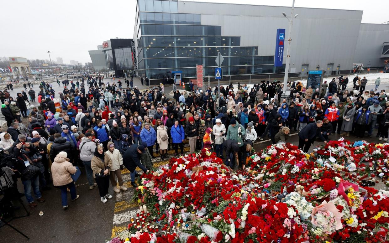 A makeshift memorial to the victims of a shooting attack set up outside the Crocus City Hall concert venue in the Moscow Region