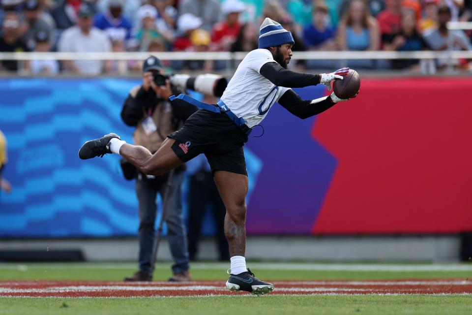 Feb 4, 2024; Orlando, FL, USA; NFC running back D’Andre Swift (0) of the Philadelphia Eagles makes a catch during the 2024 Pro Bowl at Camping World Stadium. Mandatory Credit: Nathan Ray Seebeck-USA TODAY Sports