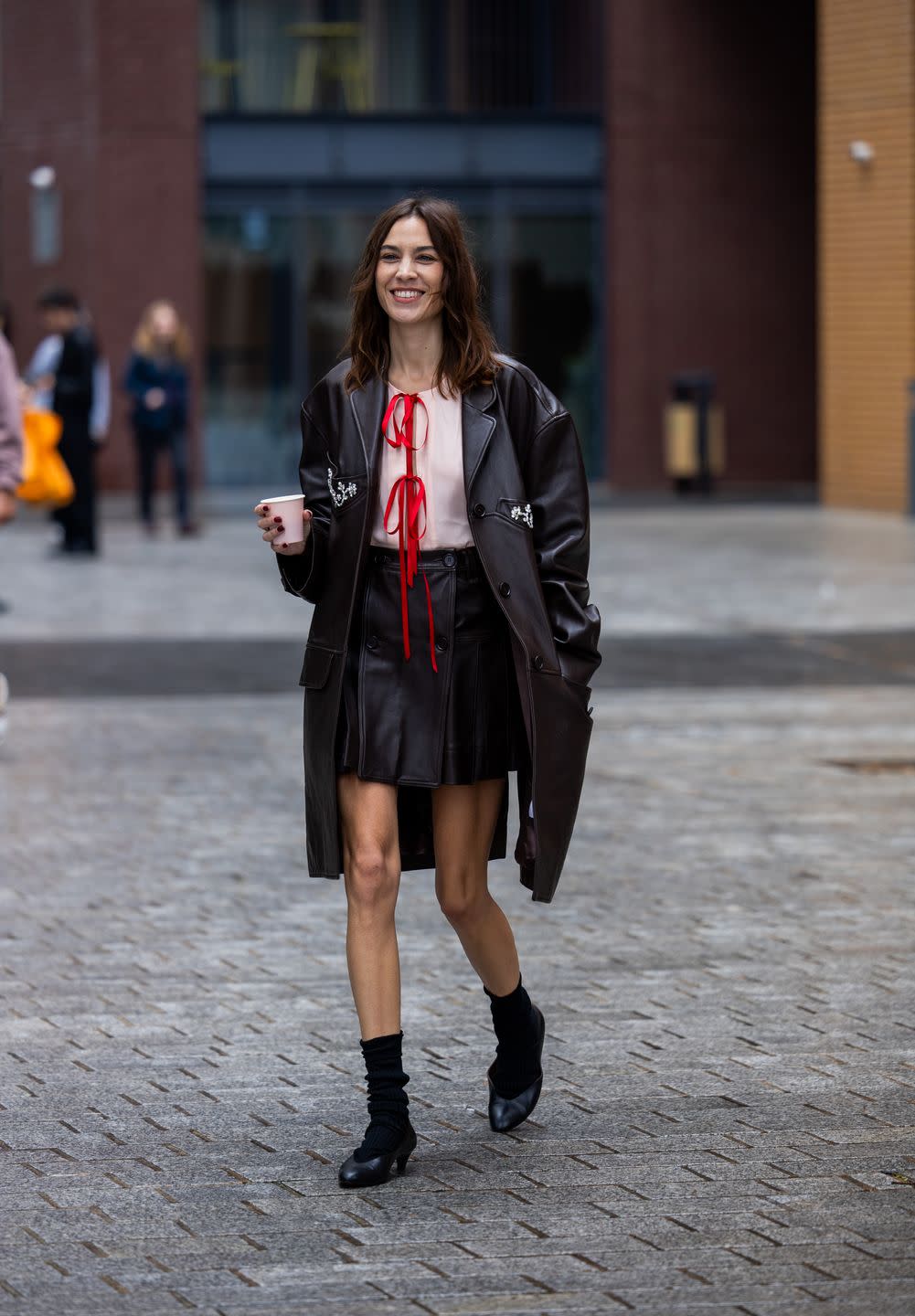 london, england september 17 alexa chung is seen wearing brown mini skirt, coat outside simone rocha during london fashion week september 2023 on september 17, 2023 in london, england photo by christian vieriggetty images