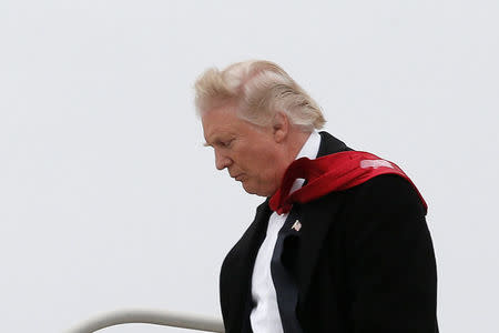 U.S. President-elect Donald Trump walks off his plane upon his arrival in Indianapolis, Indiana, U.S., December 1, 2016. REUTERS/Mike Segar