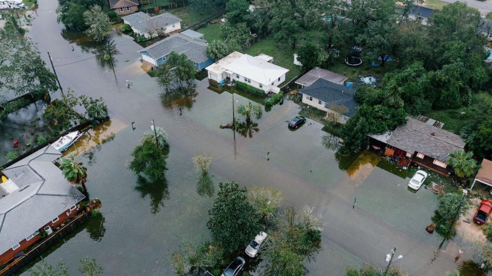 PHOTO: Downed trees and flooding in West Pensacola near the Bayou Grove and Mulworth neighborhoods. The area received a lot of damage after Hurricane Sally came through as a category 2 storm in Pensacola, La. on September 16th, 2020. (The Washington Post via Getty Images, FILE)