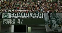 <p>Fans pay tribute to the players of Brazilian team Chapecoense Real who were killed in a plane accident in the Colombian mountains, at the club’s Arena Conda stadium in Chapeco, in the southern Brazilian state of Santa Catarina, on November 29, 2016. </p>