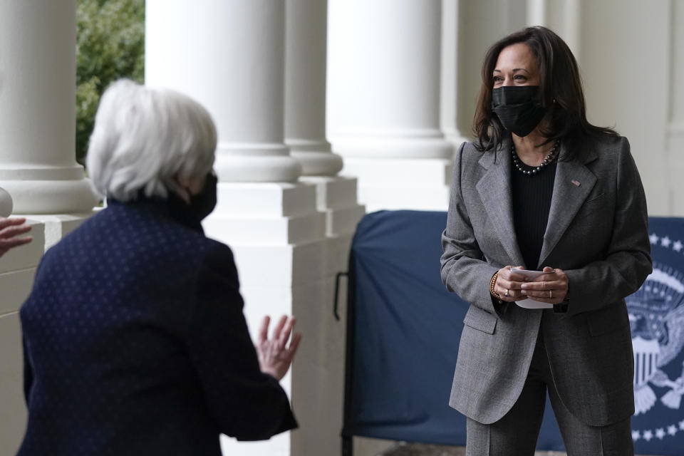 Vice President Kamala Harris departs after participating in a swearing-in ceremony with Treasury Secretary Janet Yellen, left, Tuesday, Jan. 26, 2021, at the White House in Washington. (AP Photo/Patrick Semansky)
