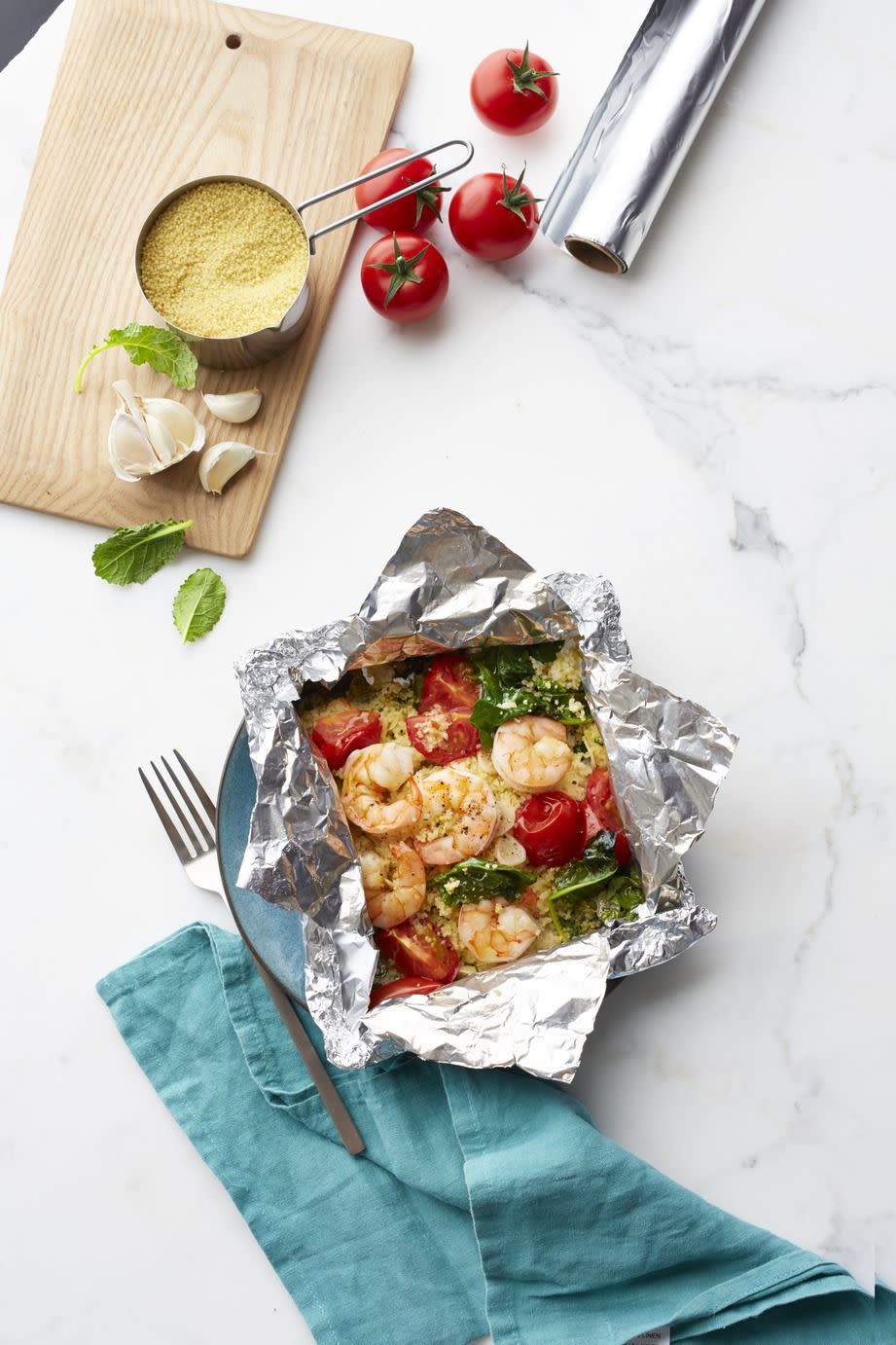 Shrimp and Garlicky Tomatoes with Kale Couscous