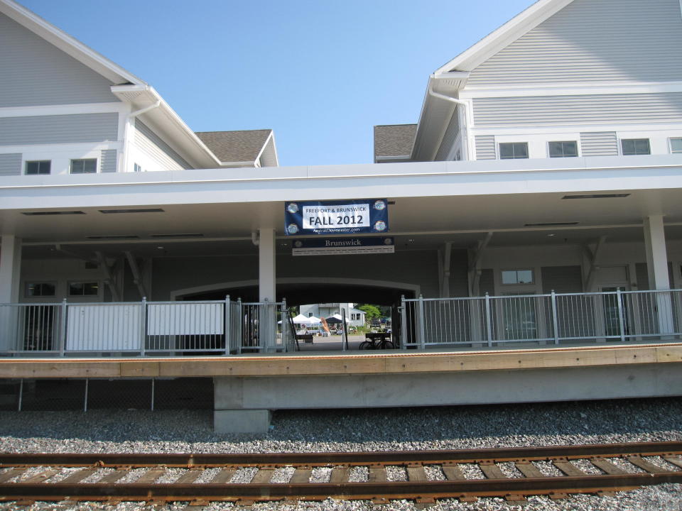 This July 13, 2012 photo shows the station and tracks in Brunswick, Maine, for Amtrak’s Downeaster train, which will extend its route from Boston and Portland to Brunswick in November. It will be the first regularly scheduled passenger rail service for the town in more than 50 years. (AP Photo/Beth Harpaz)