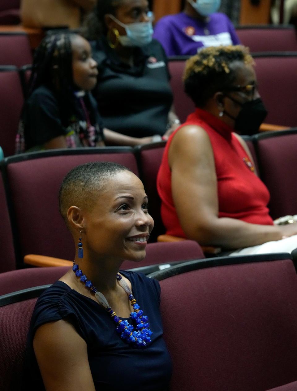 Audience members at Bethune-Cookman University view a live-stream broadcast of the unveiling of the historic Mary McLeod Bethune statue in Statuary Hall at the U.S. Capitol in Washington, D.C.