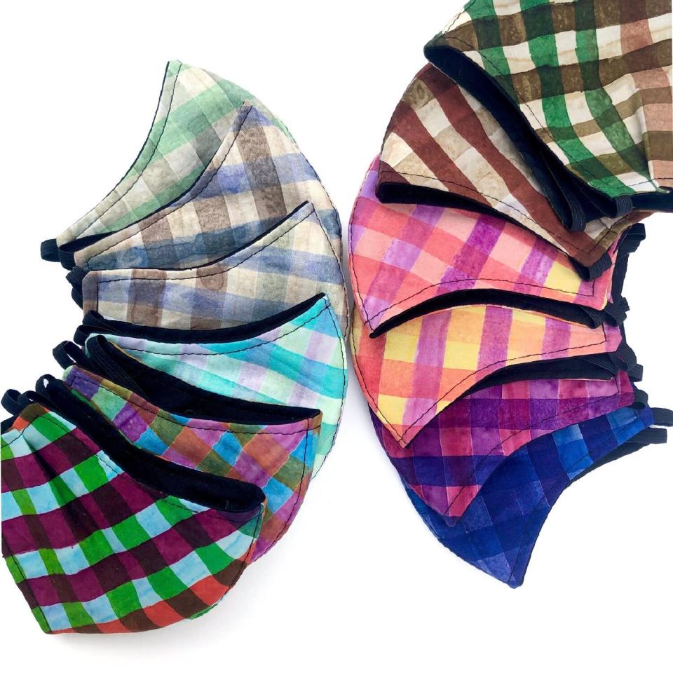 <h3>Giovanna Watercolor Gingham Face Mask</h3><br>For gingham that's prettier than a picnic blanket, check out the new face mask styles from New York-based lifestyle brand Giovanna. After making 500 masks for donation, the company has shifted to manufacturing a shoppable online collection for women, men, and teens. Each mask has a double layer of cotton and an additional layer of interfacing for extra filtration, and for every mask sold Giovanna will donate funds to cover the cost of an N95 mask for <a href="https://charity.gofundme.com/o/en/campaign/rapidresilience" rel="nofollow noopener" target="_blank" data-ylk="slk:RETI's Rapid Resilience program" class="link ">RETI's Rapid Resilience program</a>.<br><br><em>Shop </em><strong><a href="https://www.thisisgiovanna.com/face-masks" rel="nofollow noopener" target="_blank" data-ylk="slk:Giovanna" class="link "><em>Giovanna</em></a></strong> <br><br><strong>Giovanna</strong> Watercolor Gingham Face Mask, $, available at <a href="https://go.skimresources.com/?id=30283X879131&url=https%3A%2F%2Fwww.thisisgiovanna.com%2Fface-masks%2Fwomens-watercolor-gingham-face-mask" rel="nofollow noopener" target="_blank" data-ylk="slk:Giovanna" class="link ">Giovanna</a>