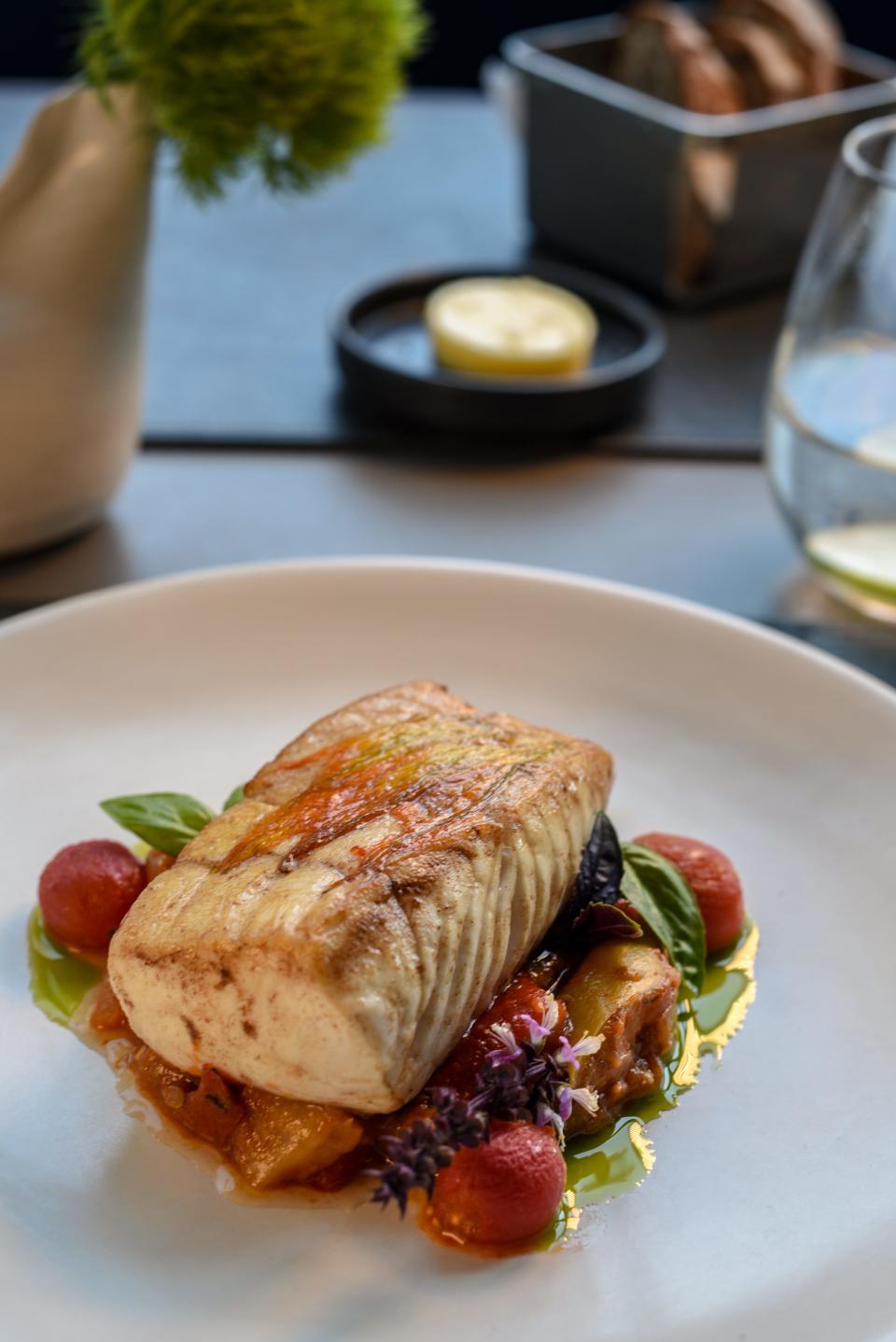 Halibut & ratatouille with confit tomatoes and basil at Faubourg in Montclair.