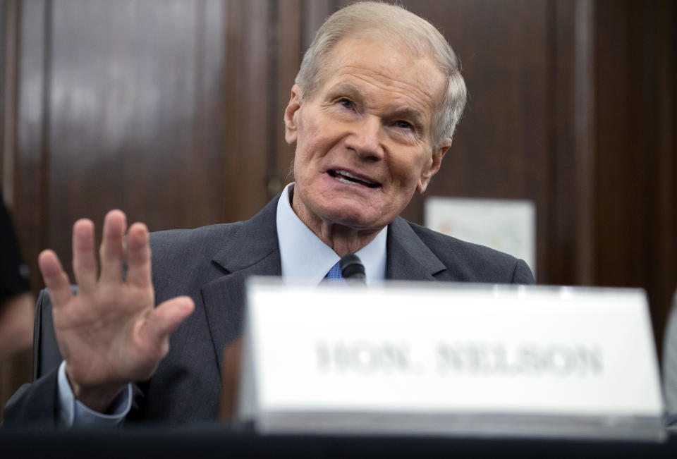 FILE - In this Wednesday, April 21, 2021 file photo, former U.S. Sen. Bill Nelson, nominee for administrator of NASA, speaks during a Senate Committee on Commerce, Science, and Transportation confirmation hearing, on Capitol Hill in Washington. In his first news interview since becoming NASA's top official this week, Nelson told The Associated Press on Friday, May 7 that measuring the climate and diversifying the workforce are top issues. Nelson hedged on whether the U.S. can put astronauts on the moon by 2024. (Saul Loeb/Pool via AP)