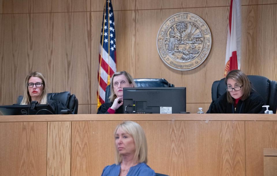 From left, Judges Jennifer Frydrychowicz, Jan Shackelford and Amy Brodersen listen during a hearing at the M.C. Blanchard Judicial Building in downtown Pensacola on Thursday, Jan. 4, 2024. Skanska attorneys have presented a motion to dismiss more than 300 lawsuits against the company claiming economic damages from the closure of the Pensacola Bay Bridge in the aftermath of Hurricane Sally.