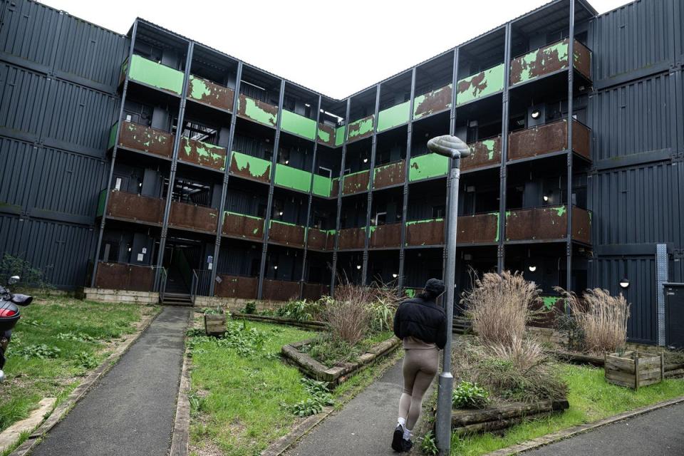 The housing is made out of 60 stacked shipping containers (Daniel Hambury/Stella Pictures Ltd)