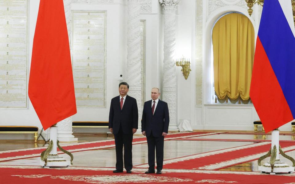 The Chinese and Russian presidents at the Kremlin on Tuesday - AFP