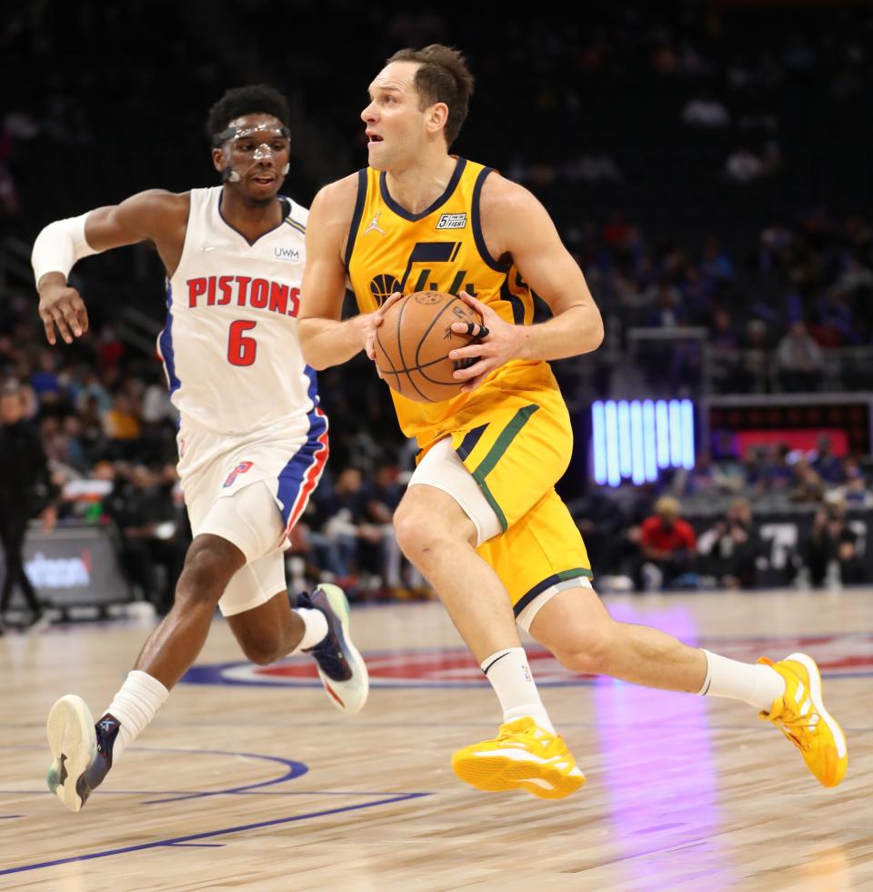 Pistons guard Hamidou Diallo defends Jazz forward Bojan Bogdanovic during the Pistons' 126-116 win on Monday, Jan. 10, 2021, at Little Caesars Arena.