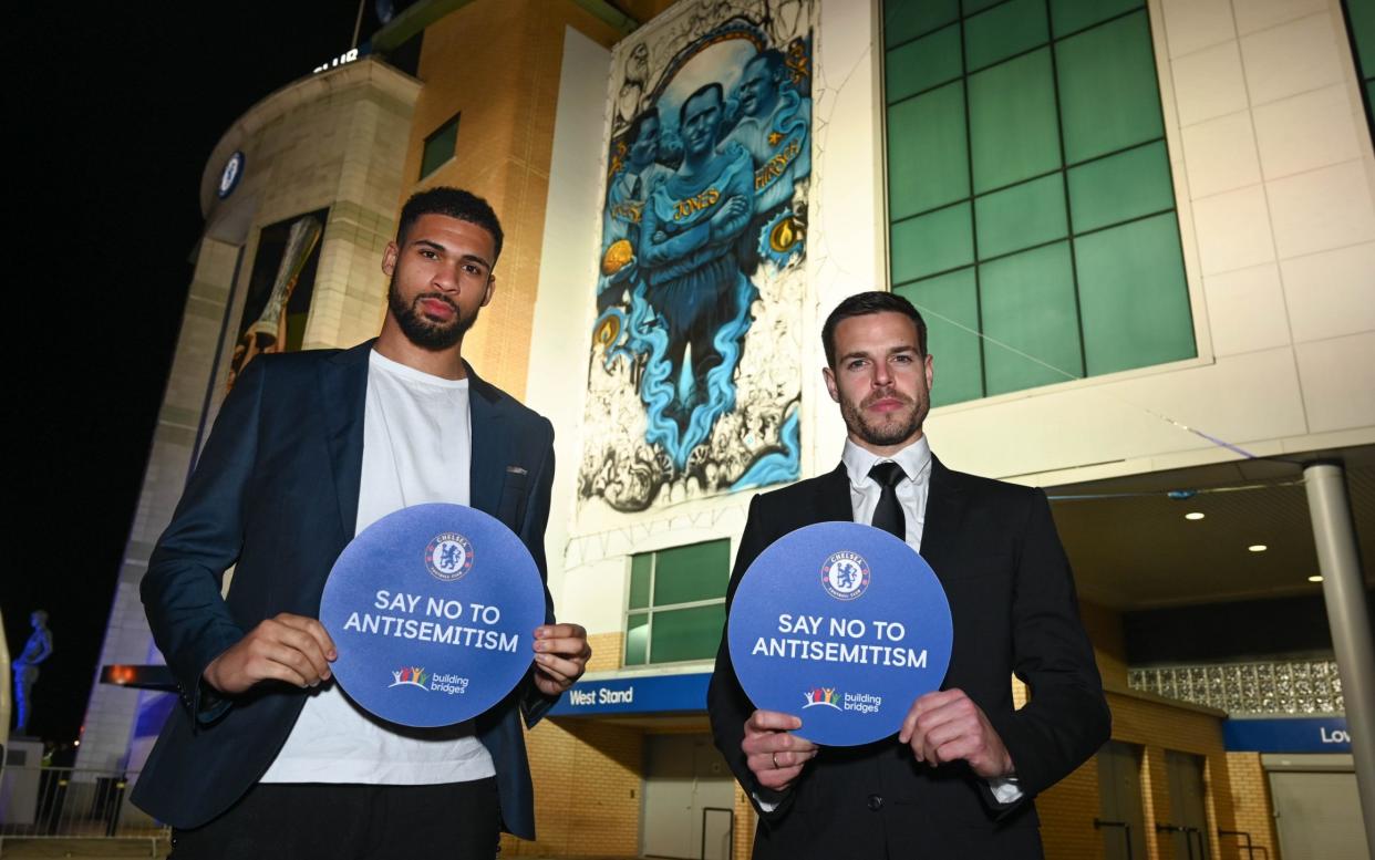 A giant mural has been painted on the side of Stamford Bridge to mark Holocaust Remembrance and the 75th anniversary of the liberation of Auschwitz - REX