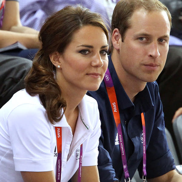 <b>Kate Middleton Top 10 Best Hairstyles:</b> Looking laid-back and casual at the Olympics with Prince William, Kate opted for a ponytail with loose curls hanging around her shoulders ©Rex