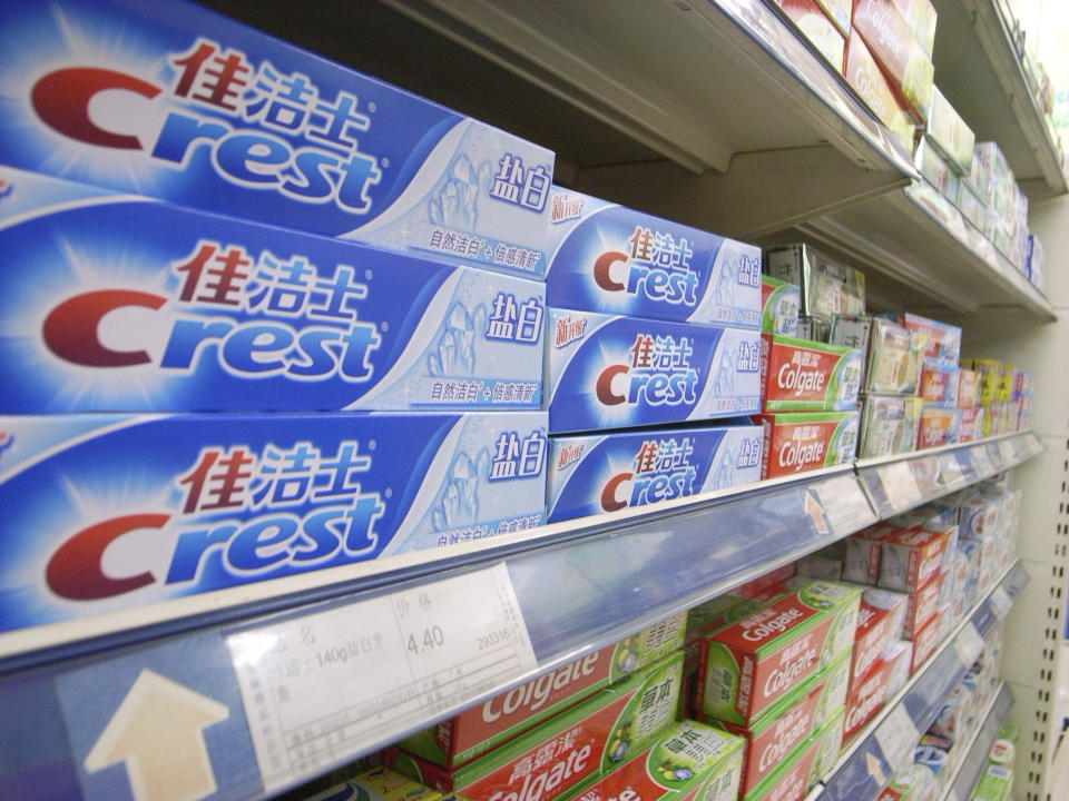 BEIJING, CHINA - 2010/06/09: Crest toothpaste, a Procter & Gamble product, competes for space with Colgate (a Colgate-Palmolive brand) on a supermarket's shelves. Procter & Gamble and Colgate-Palmolive products are both the biggest American brands of consumer products in Chinese market. (Photo by Zhang Peng/LightRocket via Getty Images)