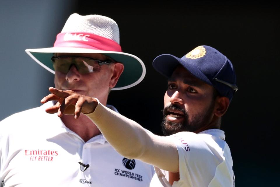 <p>India bowler Mohammed Siraj points to a section of the crowd at the Sydney Cricket Ground</p> (Getty Images)