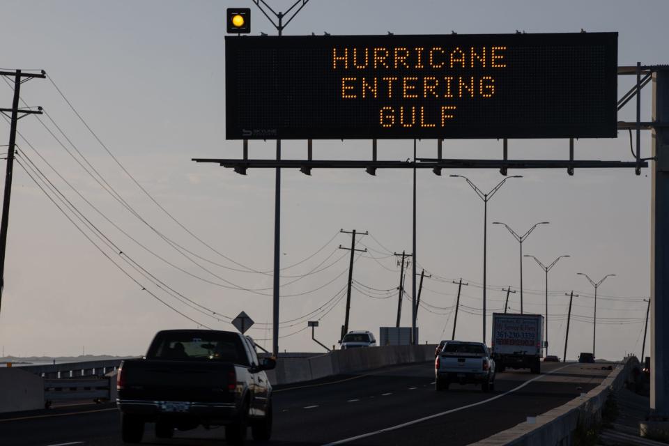 A sign near the JFK Causeway encourages traffic to prepare for a potential hurricane as Tropical Storm Beryl enters the Gulf of Mexico on Saturday, July 6, 2024, in Corpus Christi, Texas.