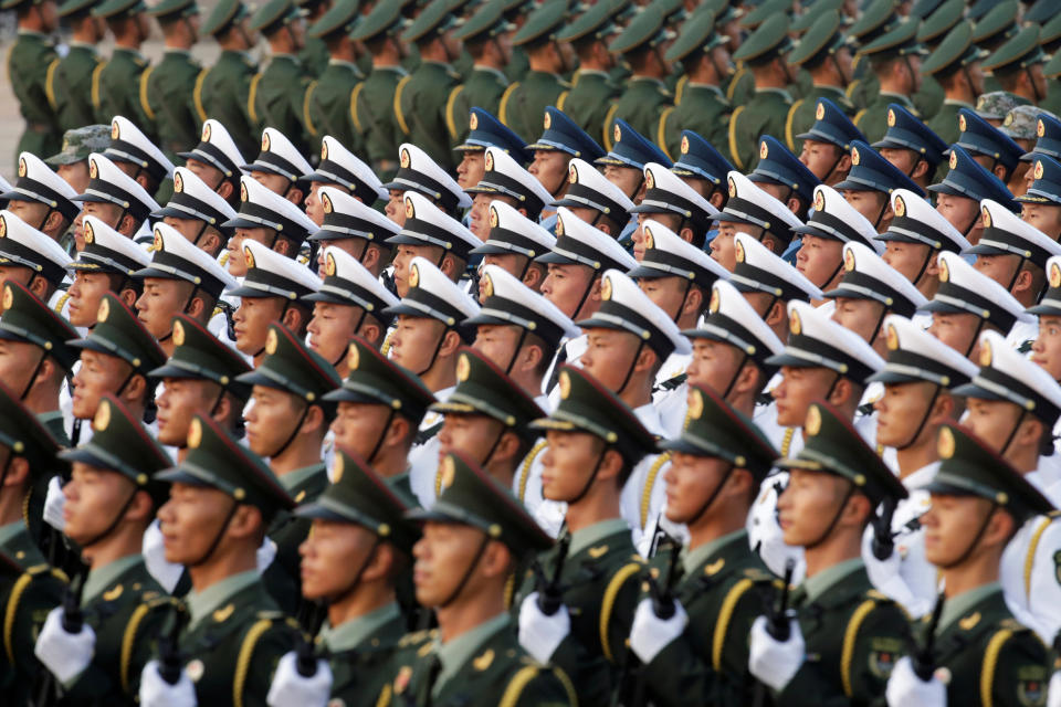 Soldiers of People's Liberation Army (PLA) stand in formation near Tiananmen Square before a military parade marking the 70th founding anniversary of People's Republic of China, on its National Day in Beijing, China October 1, 2019. (Photo: Jason Lee/Reuters)
