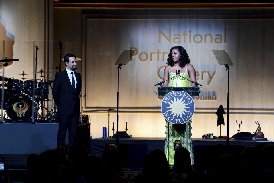 Michelle Obama awarded Lin-Manuel Miranda at the gallery. [Photo: AP]