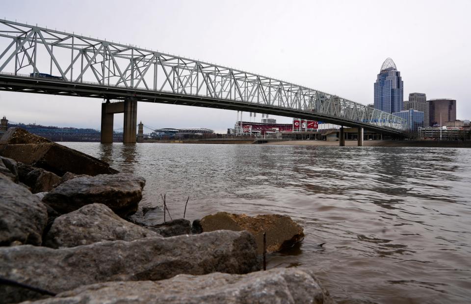 A view of the Ohio River from Newport, looking towards downtown Cincinnati, Thursday, Jan. 18, 2024. The Taylor Southgate Bridge connects the cities. The river in this area is estimated around 25 ft. deep. When people walked across the frozen river in January of 1977, there was eight to 12 inches of ice on top, which allowed people to safely cross, if you were brave enough.