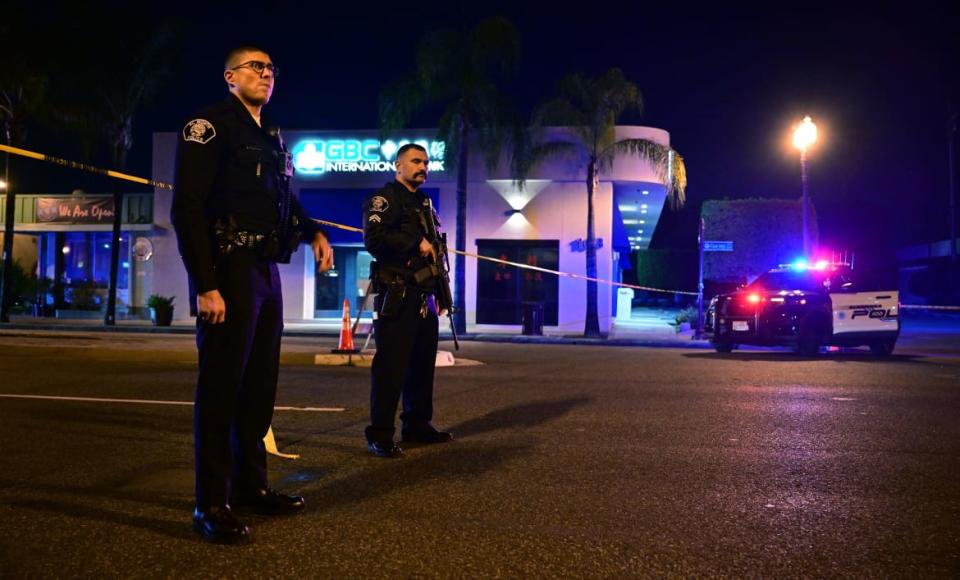 <div class="inline-image__caption"><p>Police stand guard at the scene of the mass shooting in Monterey Park, California.</p></div> <div class="inline-image__credit">Frederic J. Brown/AFP via Getty</div>