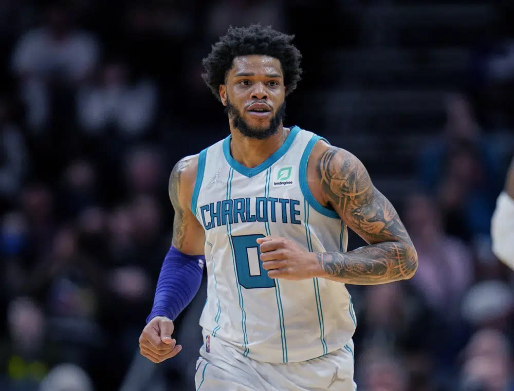 Charlotte Hornets forward Miles Bridges moves upcourt during the team’s NBA basketball game against the Denver Nuggets on March 28, 2022, in Charlotte, N.C. (AP Photo/Rusty Jones, File)