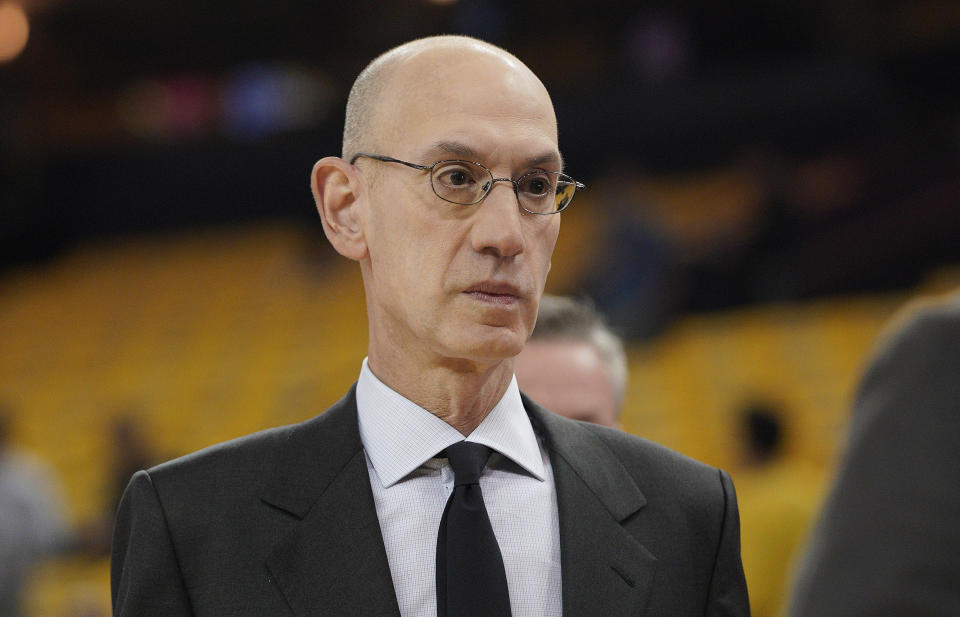 Adam Silver is confident that the NBA's Disney World bubble will shield participants from Florida's COVID-19 outbreak. (AP Photo/Tony Avelar)