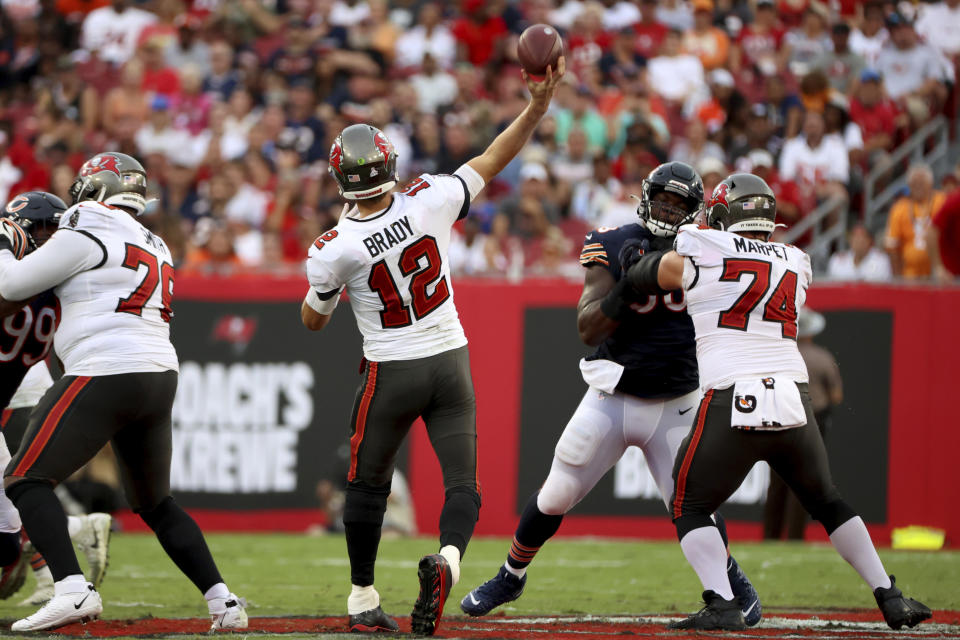 Tampa Bay Buccaneers quarterback Tom Brady (12) attempt a passan NFL football game against the Tampa Bay Buccaneers, Sunday, Oct. 24th, 2021 in Tampa, Fla. (AP Photo/Don Montague)