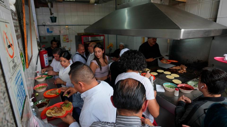 PHOTO: An overhead view of the Tacos El Califa de León taco stand, in Mexico City, May 15, 2024.   (Fernando Llano/AP)